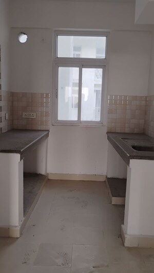 Kitchen in 2 BHK Apartment at Tulsiani Luvnest, Vrindavan Yojna – for Sale