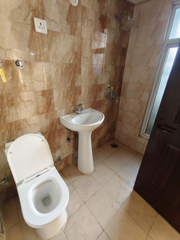 Bathroom, ajnara-integrity 2.5 Bedroom 1175 Sq.Ft. Apartment In Raj Nagar Extension Ghaziabad 10713369