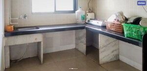 Kitchen in  Apartment at Swastik Regalia, Waghbil – for Rent