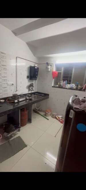 Kitchen in 2 BHK Apartment at Earnest Green Life, Hinjewadi – for Rent