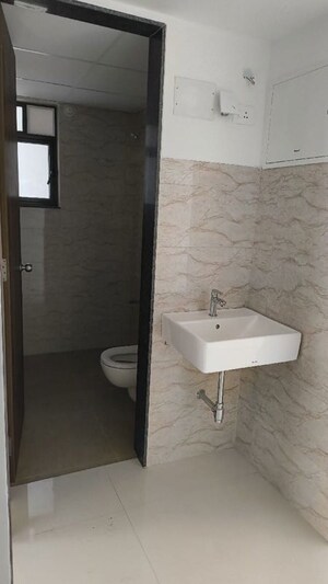Bathroom in 3 BHK Apartment at Shapoorji Pallonji Joyville Hinjewadi, Hinjewadi – for Rent