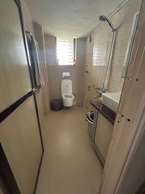 Bathroom in 2 BHK Apartment at Raj Umang 2, Dahisar East – for Rent