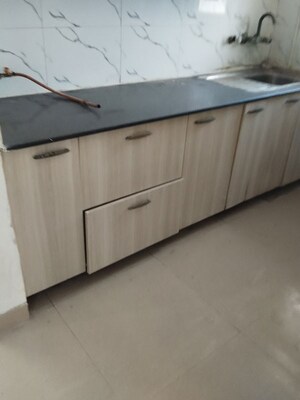 Kitchen in 2 BHK Apartment at Supertech Cape Town, Sector 74 – for Rent