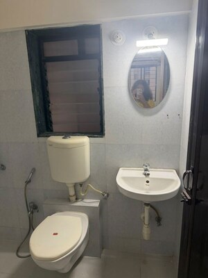 Bathroom in 2.5 BHK Apartment at Puranik City, Kasarvadavali – for Rent