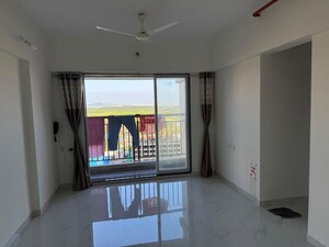 Living Room in 1 BHK Apartment at Anant Metropolis Insignia Towers, Kasarvadavali – for Rent