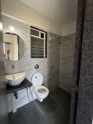 Bathroom in 1 BHK Apartment at Anant Metropolis Insignia Towers, Kasarvadavali – for Rent