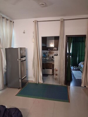 Living Room in 2 BHK Apartment at Proview Officer City, Raj Nagar Extension – for Rent