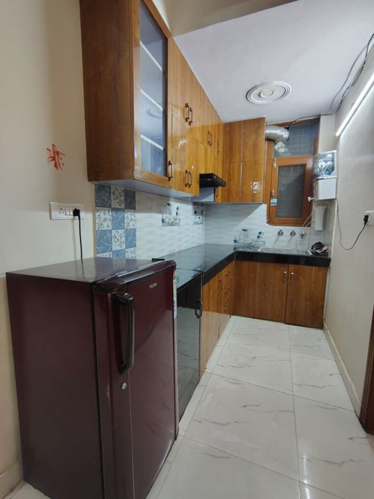 Kitchen, kendriya-lok-nirman-chs 2 Bedroom 667 Sq.Ft. Apartment In Phi Iv Greater Noida Greater Noida 10713869