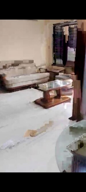 Living Room in 2 BHK Apartment at Wood Rose CHS, Andheri West – for Rent