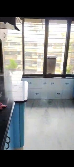 Kitchen in 2 BHK Apartment at Wood Rose CHS, Andheri West – for Rent