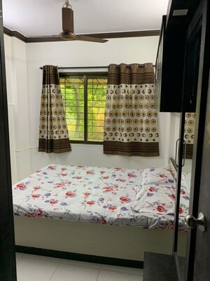 Bedroom in 2 BHK Apartment at Subham Residency Kopar Khairane, Kopar Khairane Sector 1a – for Rent
