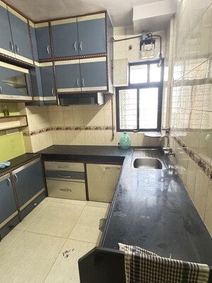 Kitchen in 2 BHK Apartment at New Anand Park CHS, Wagle Industrial Estate – for Sale