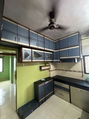 Kitchen in 2 BHK Apartment at New Anand Park CHS, Wagle Industrial Estate – for Sale