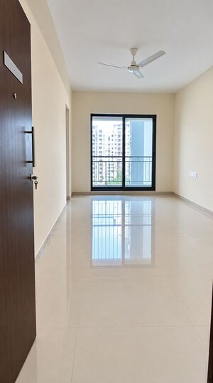 Living Room in 2 BHK Apartment at Rustomjee Virar Avenue L1 L2 And L4 Wing H, Virar West – for Rent