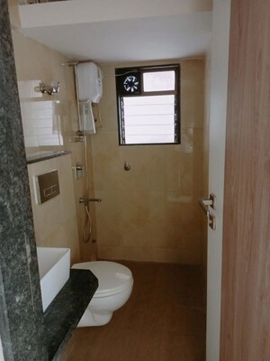 Bathroom in 2 BHK Apartment at Vinay Unique Gardens, Virar West – for Rent
