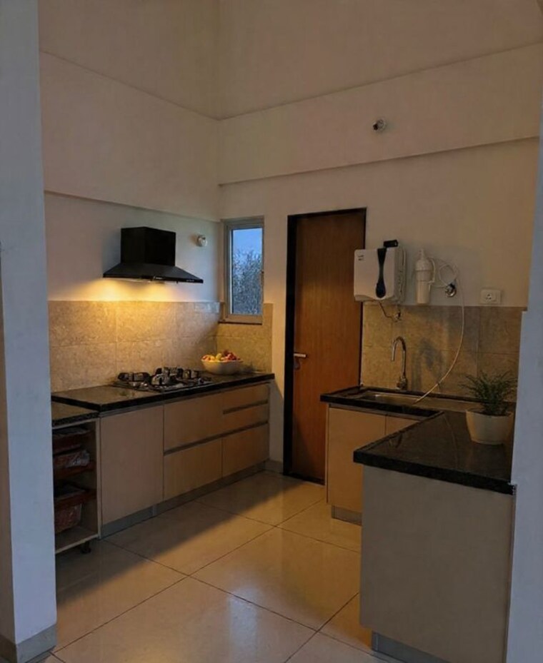 Kitchen, gera-planet-of-joy 2 Bedroom 773 Sq.Ft. Apartment In Kharadi Pune 10714472