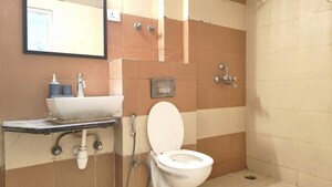 Bathroom in 3 BHK Apartment at Mahagun Mywoods, Sector 16c Greater Noida – for Sale