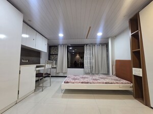 Living Room in 2 BHK Apartment at Nagari Niwara CHS, Goregaon East – for Rent