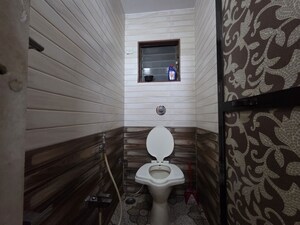Bathroom in 2 BHK Apartment at Nagari Niwara CHS, Goregaon East – for Rent