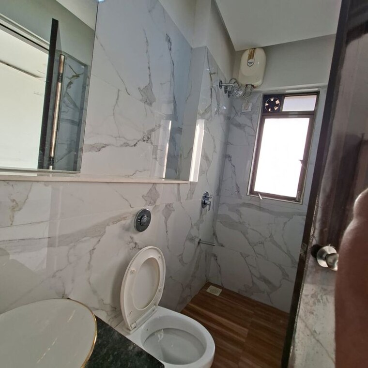 Bathroom, lotus-unity 3 Bedroom 1003 Sq.Ft. Apartment In Versova Mumbai 10714498