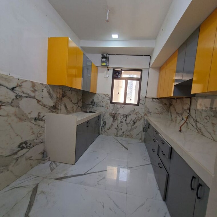 Kitchen, lotus-unity 3 Bedroom 1003 Sq.Ft. Apartment In Versova Mumbai 10714498