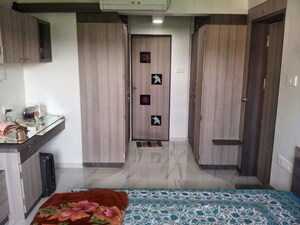 Living Room in 1 BHK Apartment at Rohan Garden, Kothrud – for Rent