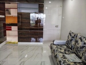 Living Room in 1 BHK Apartment at Rohan Garden, Kothrud – for Rent