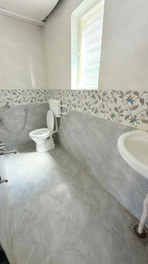 Bathroom in 2 BHK Apartment at Seema Garden, Kothrud – for Rent