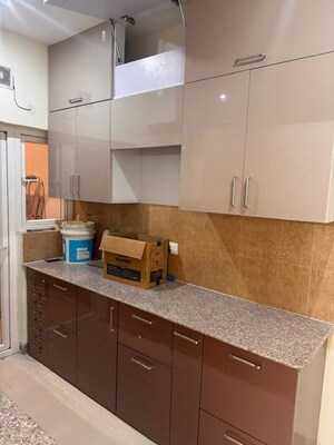 Kitchen in 2 BHK Apartment at Pardos Okas Residency, Sushant Golf City – for Rent