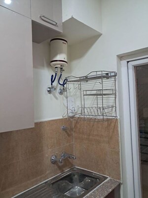 Bathroom in 2 BHK Apartment at Pardos Okas Residency, Sushant Golf City – for Rent