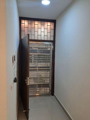 Staircase in 2 BHK Apartment at Pardos Okas Residency, Sushant Golf City – for Rent