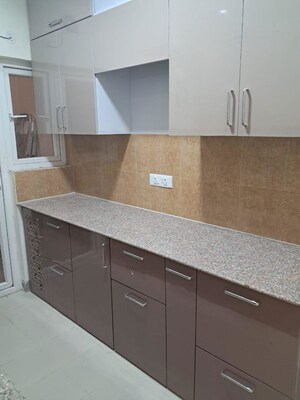 Kitchen in 2 BHK Apartment at Pardos Okas Residency, Sushant Golf City – for Rent