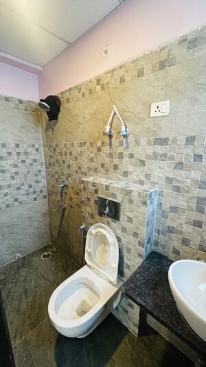 Bathroom in 3 BHK Apartment at Omaxe The Palace, Gomti Nagar – for Rent
