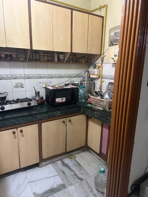Kitchen in 1 BHK Builder Floor at Khirki Extension – for Rent
