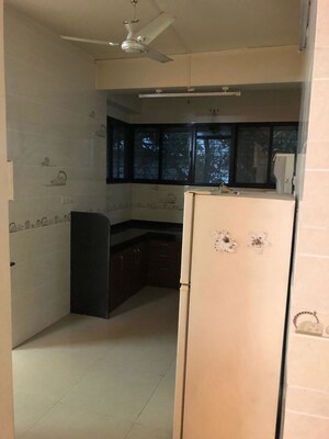 Kitchen in 2 BHK Apartment at Sakal Nagar CHS, Aundh – for Rent