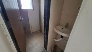 Bathroom in 2 BHK Apartment at Kedar Krishna Kunj Residency, Vadgaon Budruk – for Rent