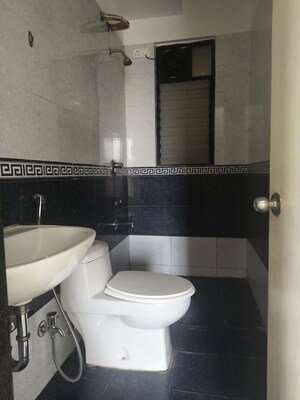 Bathroom in 2 BHK Apartment at Sarang Nanded City, Sinhagad – for Rent