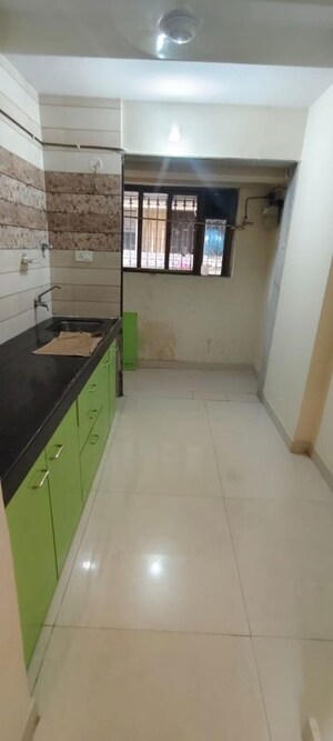 Kitchen in 2 BHK Apartment at Vaibhav Apartment Naupada, Naupada – for Rent