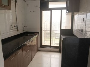 Kitchen in 2 BHK Apartment at Laxmi Paradise, Mira Road – for Rent