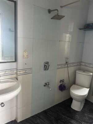 Bathroom in 2 BHK Apartment at Lokhandwala Galaxy, Byculla – for Sale