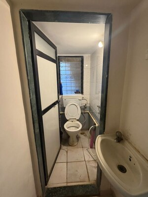 Bathroom in 2 BHK Apartment at Harasiddh Viraaj, Malad East – for Rent