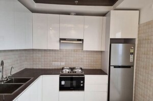 Kitchen in 3 BHK Apartment at Supertech Supernova Astralis, Sector 94 – for Sale