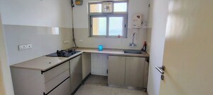 Kitchen in 1 BHK Apartment at Hiranandani Estate Solitaire C, Ghodbunder Road – for Rent