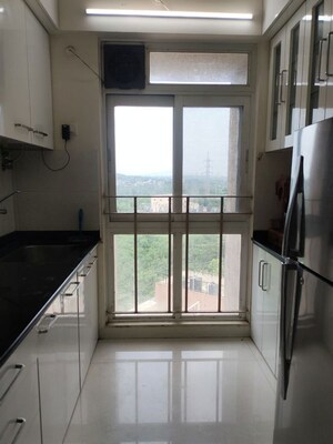 Kitchen in 1 BHK Apartment at Vijay Orovia, Ghodbunder Road – for Rent