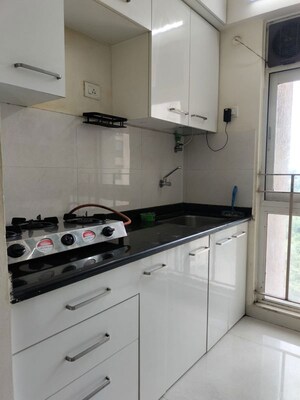 Kitchen in 1 BHK Apartment at Vijay Orovia, Ghodbunder Road – for Rent
