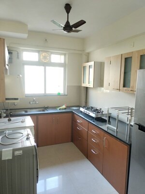 Kitchen in 2 BHK Apartment at Hiranandani Estate Winona, Ghodbunder Road – for Rent