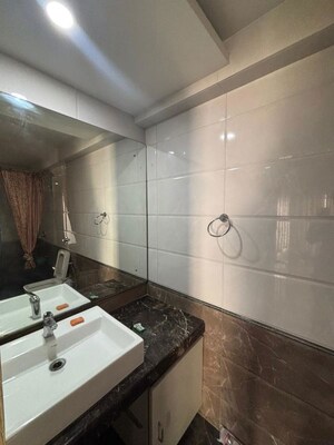 Bathroom in 4 BHK Apartment at DLH Sorrento, Veera Desai Road – for Sale