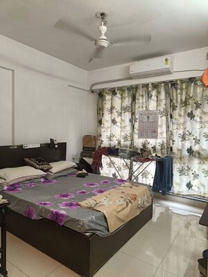 Bedroom in 1 BHK Apartment at Agarwal Residency CHS, Nalasopara East – for Rent