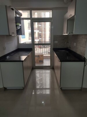 Kitchen in 2 BHK Apartment at Suncity Avenue 76, Sector 76 – for Sale