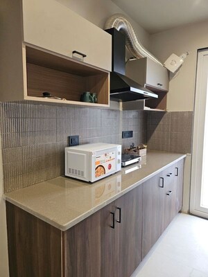 Kitchen in 3 BHK Apartment at Mahindra Luminare, Sector 59 – for Sale